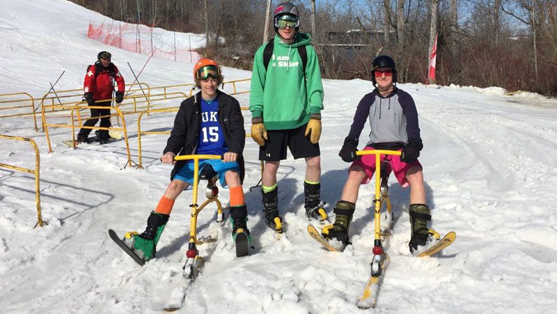 People using snowbikes