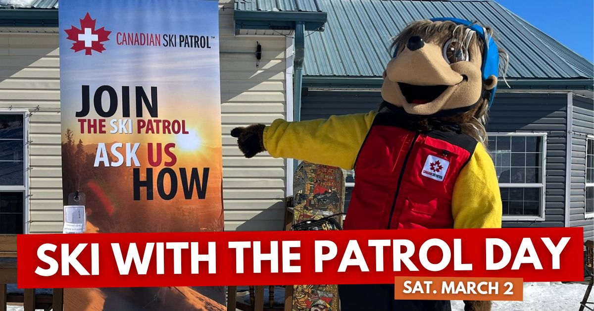 The Canadian Ski Patrol mascot stands next to a banner promoting joining the Canadian Ski Patrol.